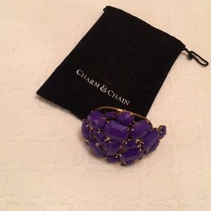 Gold metal w/purple stones hinged bangle bracelet